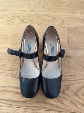 Prada Black Leather Mary Jane Pumps with Round Buckle Strap and Daisy Heel